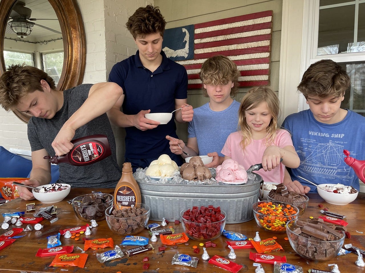 author's kids assembling their sundaes